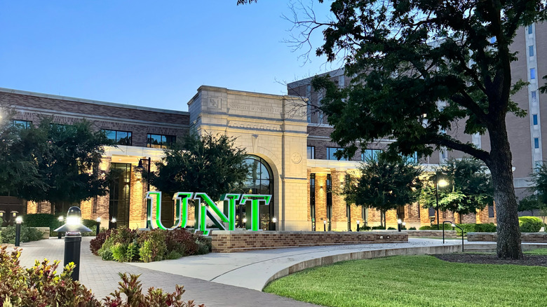 University of North Texas campus arches lit at dusk