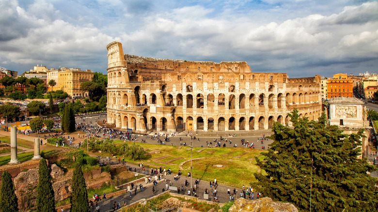 Aerial view of crowds and Roman Colosseum