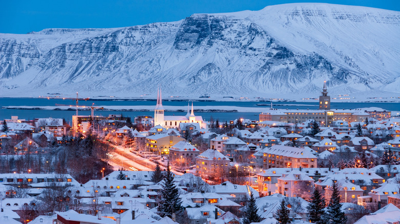 The capital of Iceland lit up in the snow