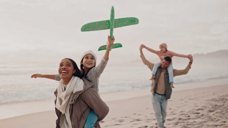 A family playing on a beach in Puerto Rico