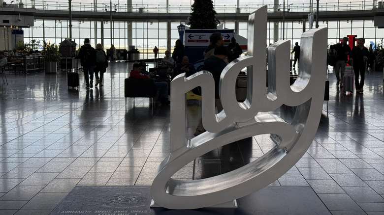 Terminal building with "Indy" photo op sign at Indianapolis Airport in Indiana, as seen on Dec 3, 2024.