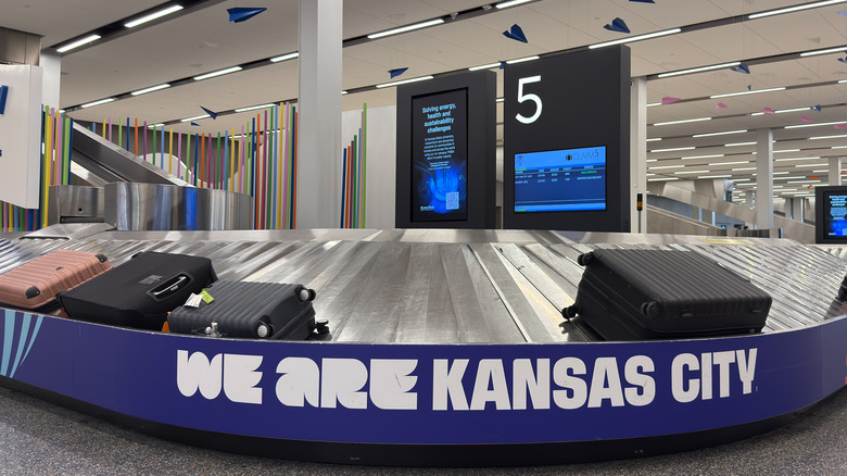 "We Are Kansas City" signage at the luggage belt at Kansas City International Airport on June 16, 2026