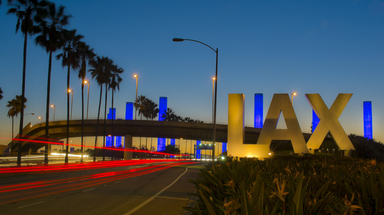 Long exposure of the iconic LAX Los Angeles International Airport exterior sign at night
