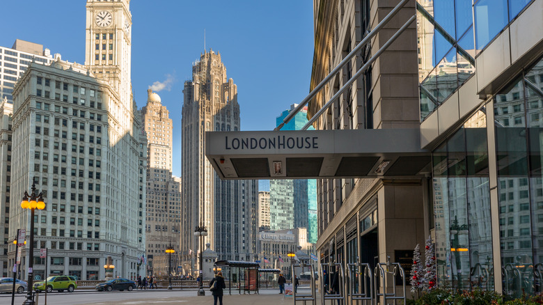 Entrance to LondonHouse hotel in Chicago with high-rises in the background.