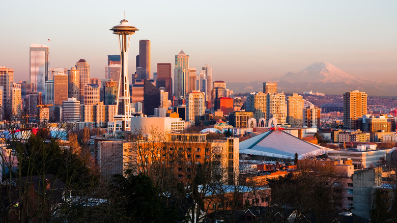 Downtown Seattle with the Space Needle and high-rises during sunrise.