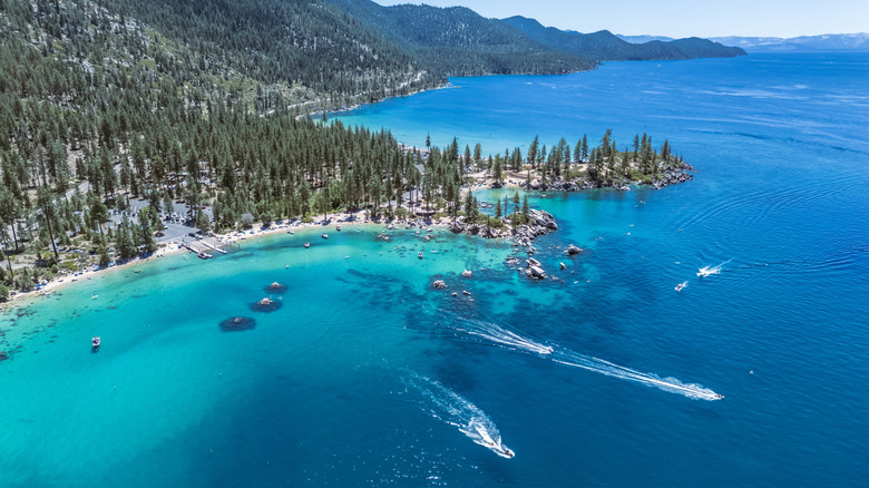 aerial view of lake tahoe with boats and mountains in summer