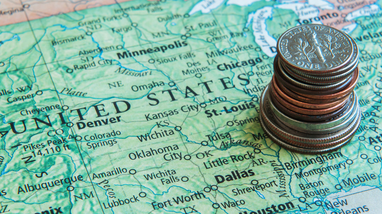 Coins stacked on a US map