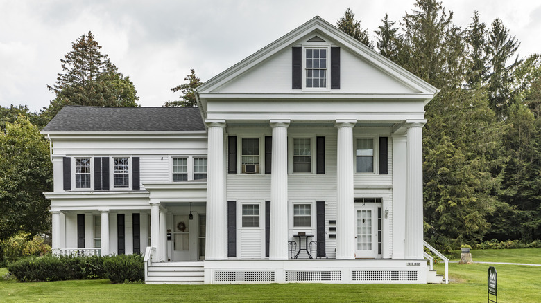 A typical wooden small farm house in victorian style in Bennington, Vermont, USA in the green mountain area.
