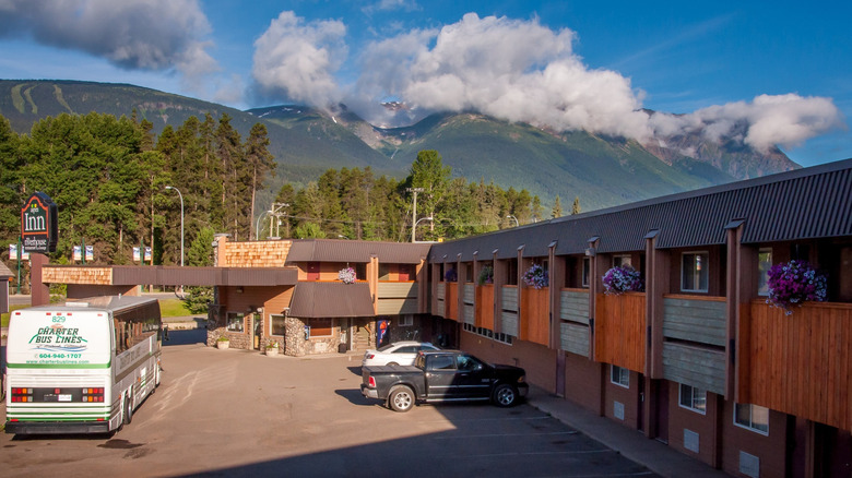 alpine-style inn in Smithers, with towering mountains visible in distance