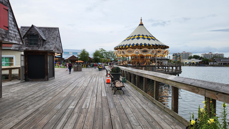 A view of the boardwalk and carousel at Barefoot Landing