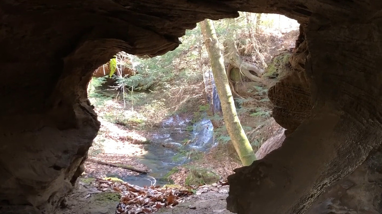 View of Grotto Falls from an arch in the backcountry of Mammoth Cave National Park