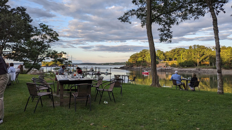 Outside tables at the Diamond Edge Restaurant on the island of Diamond Cove, in Portland, Maine
