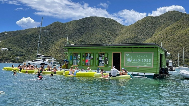 People floating outside of Lime Out on the water