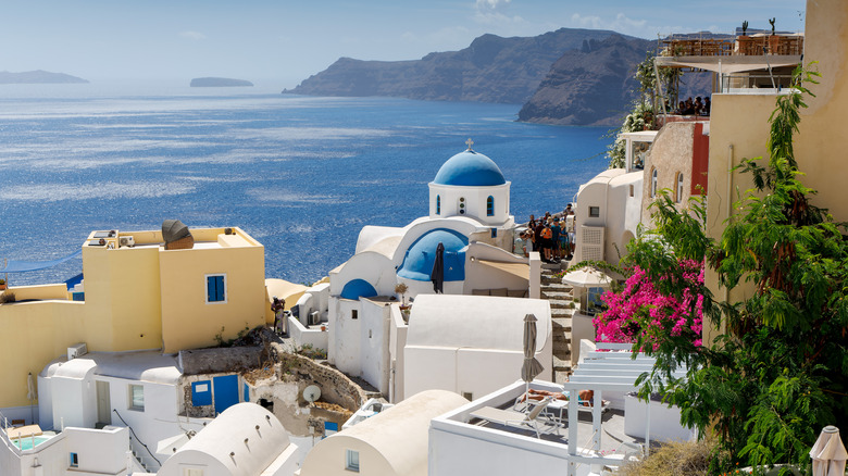 Santorini's whitewashed buildings in September.