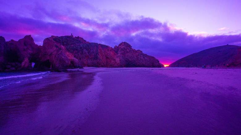 The sun setting on Pfeiffer Beach's purple sands