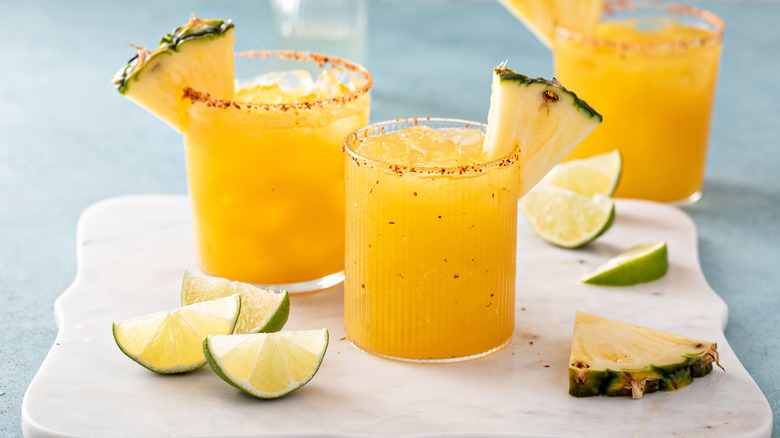 yellow-orange margaritas with pineapple