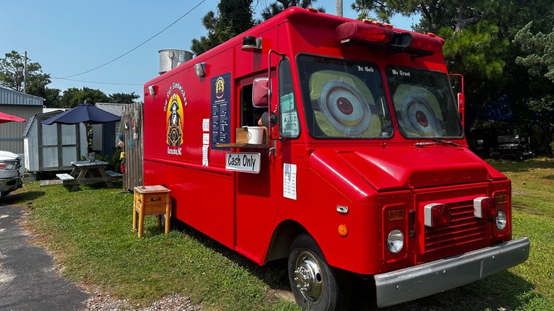The bright red Old Salt Sandwiches food truck on Ocracoke Island in North Carolina's Outer Banks