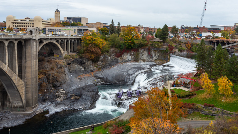 Downtown Spokane and the Spokane River surrounded by fall foliage