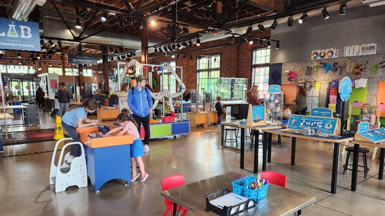 Families exploring interactive exhibits at Mobius Discovery Center in Spokane