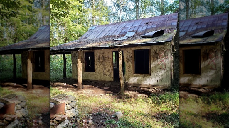 Graffiti-covered walls of an abandoned house in Lost Cove, North Carolina