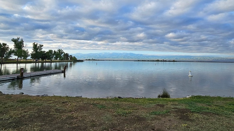 Lake with mountains in the distance