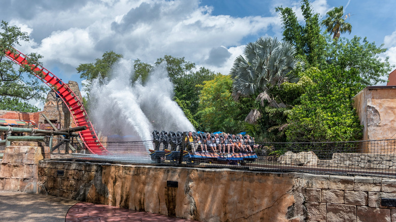 Riders on a roller coaster at Busch Gardens Tampa Bay get splashed by water