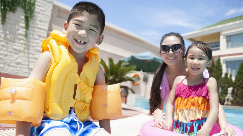 A child wearing flotation devices