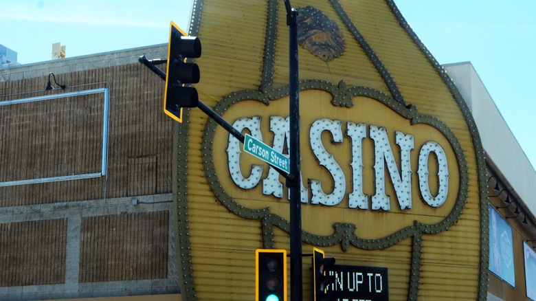 Daytime view of the vintage Carson Nugget "Casino" sign on Carson Street in Carson City, Nevada