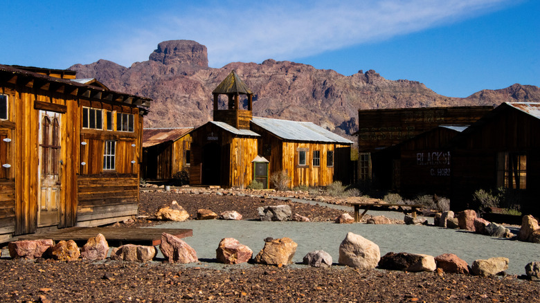A wood-built church stands in the desert mountains in Castle Dome, Arizona