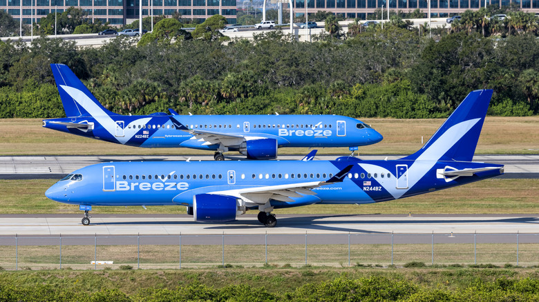 Two Breeze Airways Airbus A220-300 airplanes at Tampa Airport in the United States.