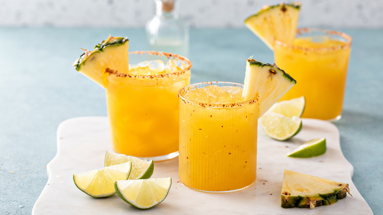 yellow-orange margaritas with pineapple