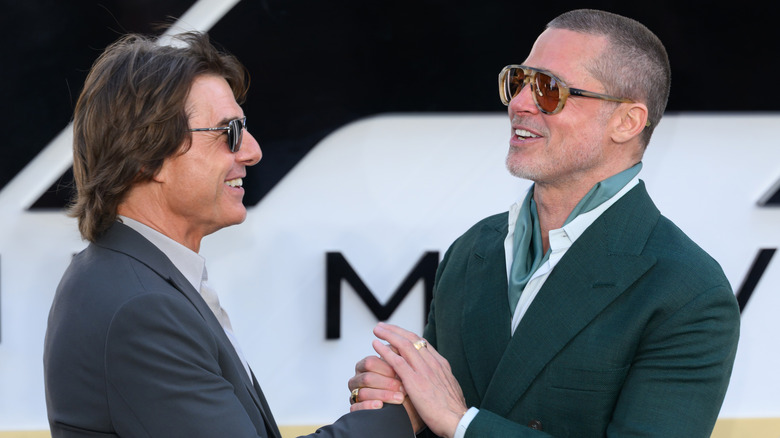 Celebrity actors Tom Cruise and Brad Pitt at a movie premier in the U.K.