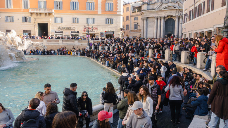 Large crowd at Trevi Fountain in Rome
