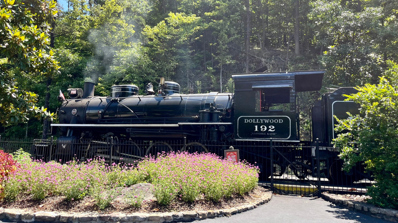 View of the vintage locomotive at the Dollywood Express attraction train ride attraction