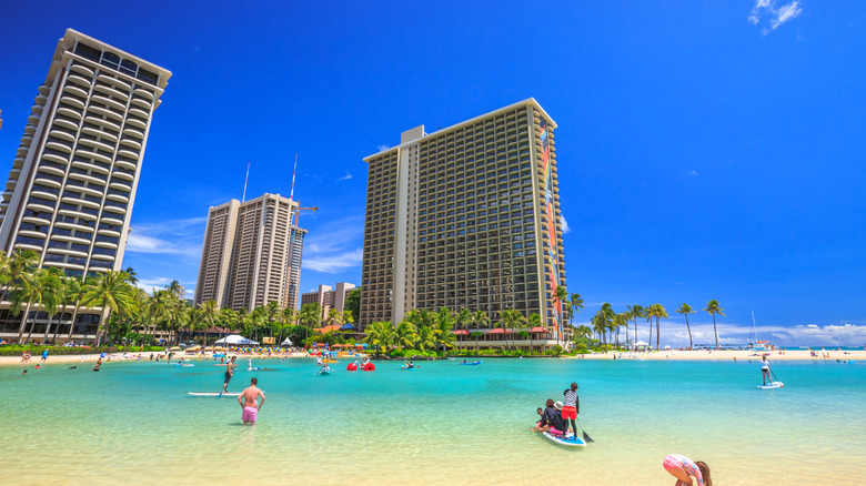 Hilton Hawaiian Village to the left of Duke Kahanamoku Beach.