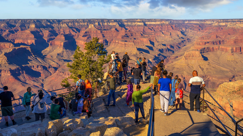 Tourists gather at Mather Point on the South Rim of the Grand Canyon