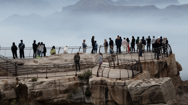 Smoke from the Dragon Bravo fire settles into the Grand Canyon along the South Rim at Mather Point on July 17, 2025 in Grand Canyon, Arizona