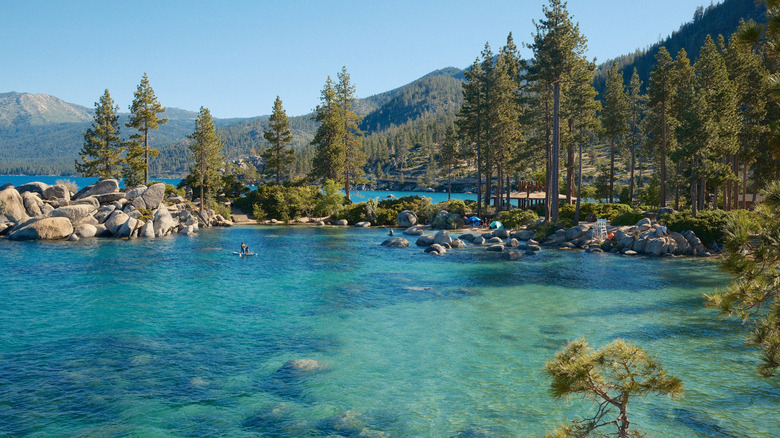 View of beautiful blue Lake Tahoe water at popular Sand Harbor on a sunny day