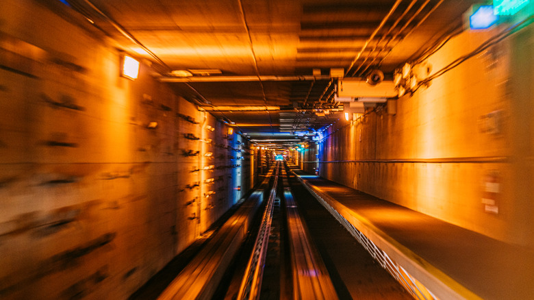 Artistic long exposure shot of the underground train tunnels at Denver International Airport in Colorado