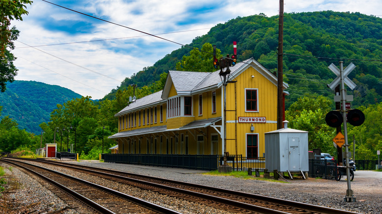 View of very small, quaint Thurmond, West Virginia Amtrak Station on a cloudy day