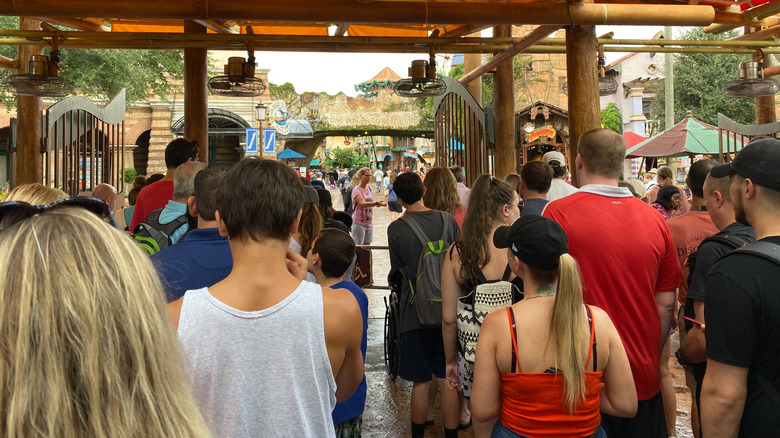 View of queue at Universal Studios Orlando with throngs of people