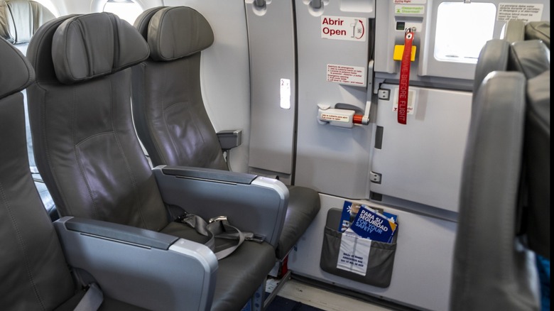An emergency airplane seat row