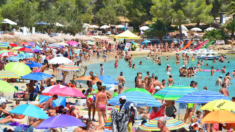 A packed beach in Ibiza