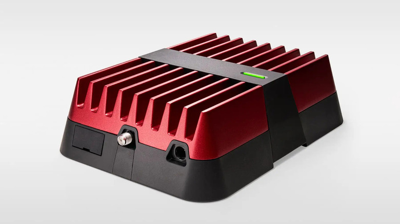 WeBoost overland cellular booster on a gray background