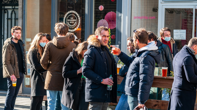 A group of locals on a street in Paris