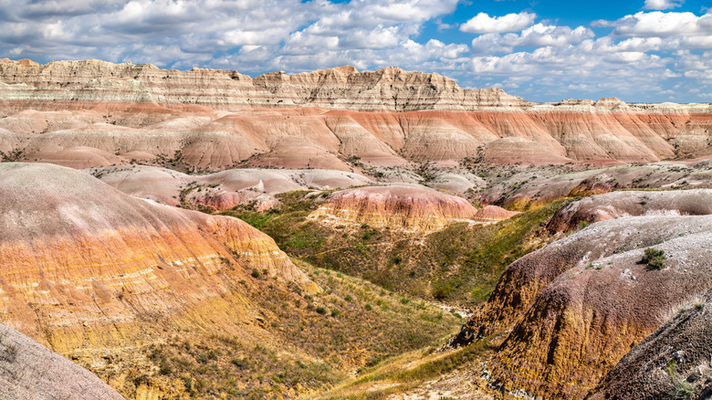 Colorful sedimentary rock layers in Badlands National Park, South Dakota.