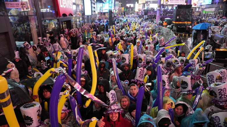 A crowd of people waiting for the ball to drop in New Year's Eve day