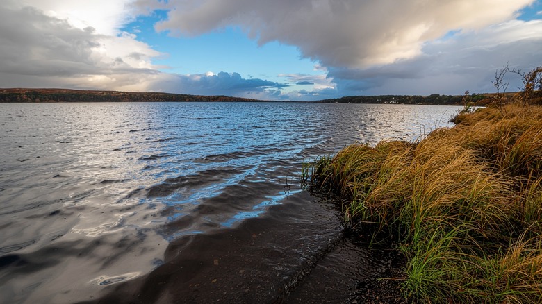 Lake Bosomtwe on a partly cloudy day, Ghana
