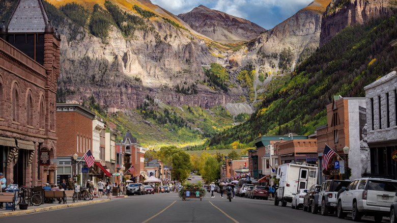 View of the main drag in Telluride, Colorado during the fall season with vintage shops, restaurants, and businesses