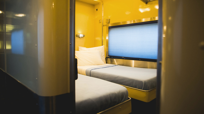 A two-bed cabin on a sleeper train.